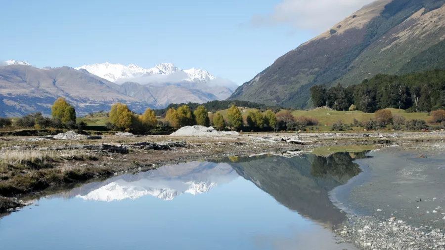 Paradise near Glenorchy with mountain reflections and river stones