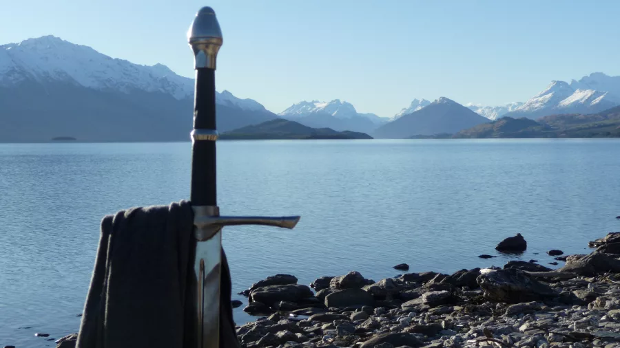Sword and cloak beside Lake Wakatipu on Glenorchy Lord of the Rings tour