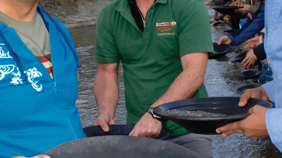 Guests gold panning on Queenstown Lord of the Rings tour