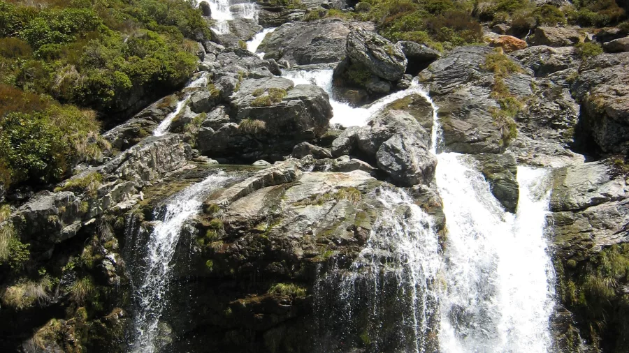 Cascading waterfall along the Routeburn Track in Mt Aspiring National Park