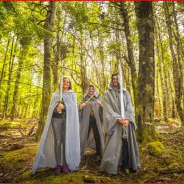 Guests dressed as three knights from Lord of the Rings, standing in forest during Pure Glenorchy tour