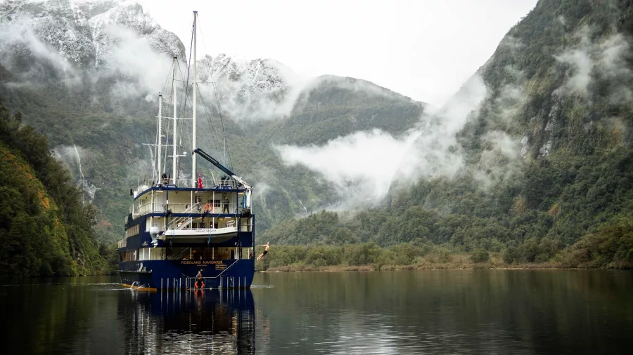 Fiordland Navigator floating in the misty morning calm of Doubtful Sound