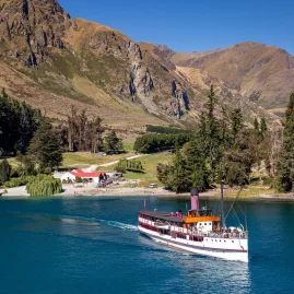 TSS Earnslaw steamship departing Walter Peak Station across Lake Whakatipu