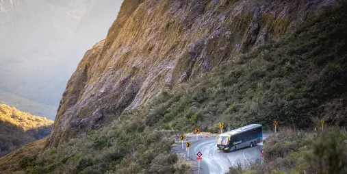 Milford road hairpin turn tour coach