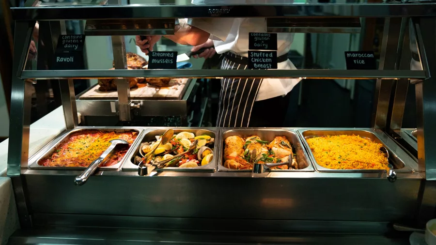 Hot buffet selection with chef on board Milford Mariner