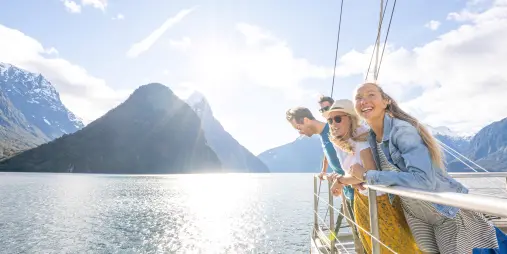 Happy cruise guests scenic view milford sound
