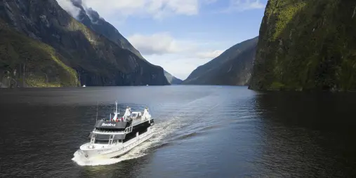 Milford sovereign vessel day cruise through fiord