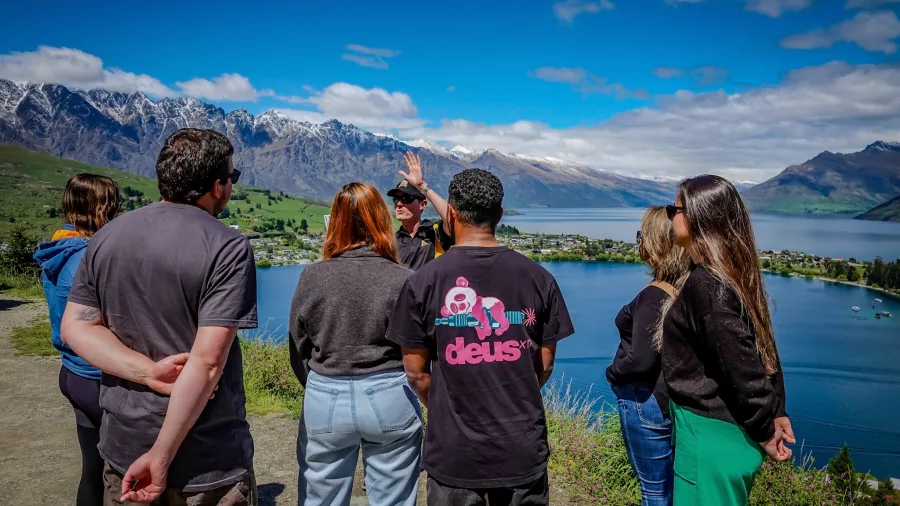 Tour group learning about Lord of the Rings filming near Lake Wakatipu, Queenstown