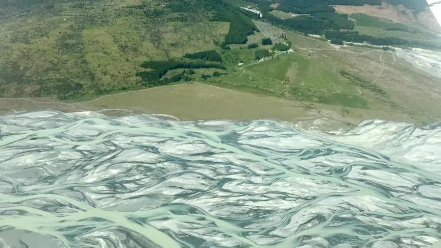 Braided Tasman River near Glentanner Station seen from a scenic flight to Aoraki / Mount Cook with True South Flights