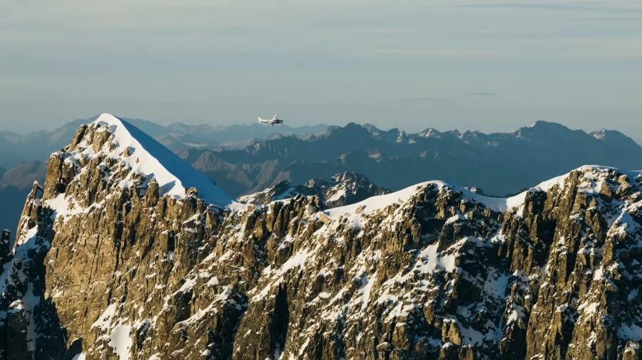 True South plane flying over rugged snowy peaks of the Southern Alps