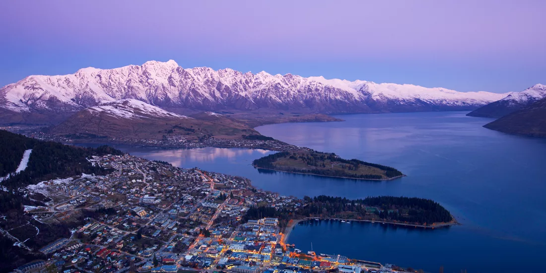Queenstown overlooking Lake Wakatipu and the snow-capped Southern Alps at sunset