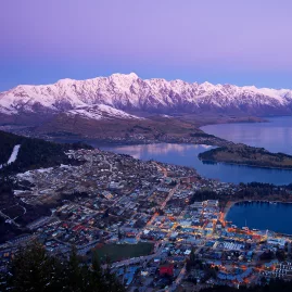 Queenstown overlooking Lake Wakatipu and the snow-capped Southern Alps at sunset