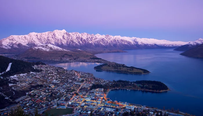 Queenstown overlooking Lake Wakatipu and the snow-capped Southern Alps at sunset