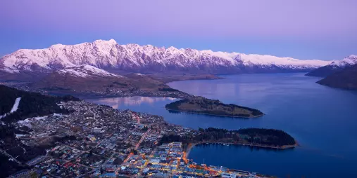 Queenstown overlooking Lake Wakatipu and the snow-capped Southern Alps at sunset