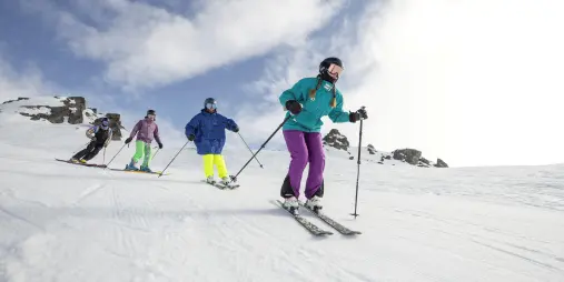Skiers enjoying Cardrona Alpine Resort, the largest ski resort in New Zealand near Queenstown and Wānaka