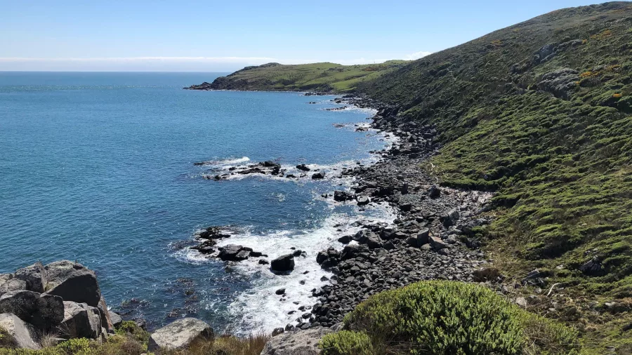 Rugged coastline and blue sea from Bluff Hill lookout