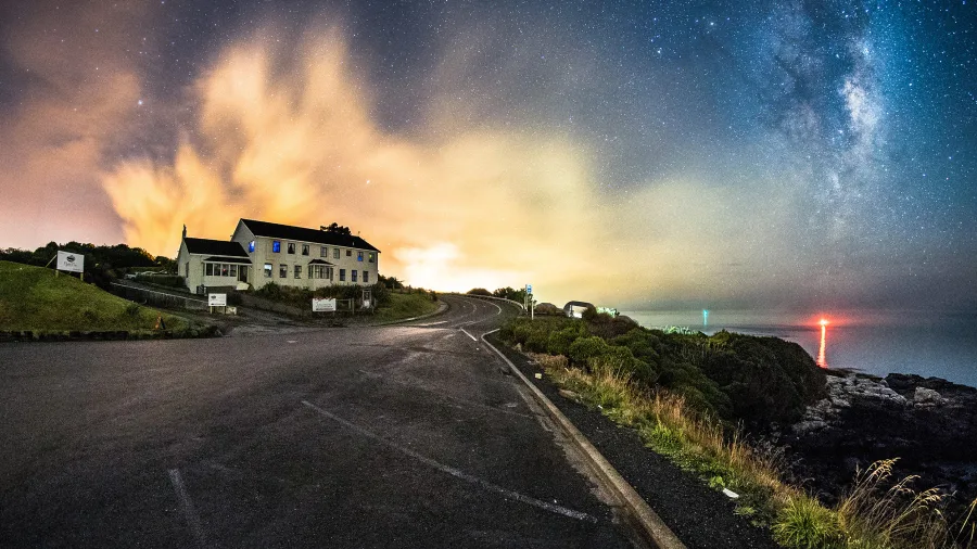 Southern Lights and Milky Way above Stirling Point in Bluff, Southland