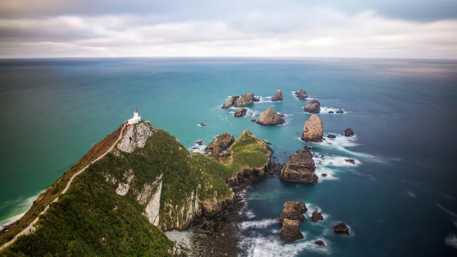 Nugget Point Lighthouse and coastal cliffs in The Catlins, Southland, New Zealand