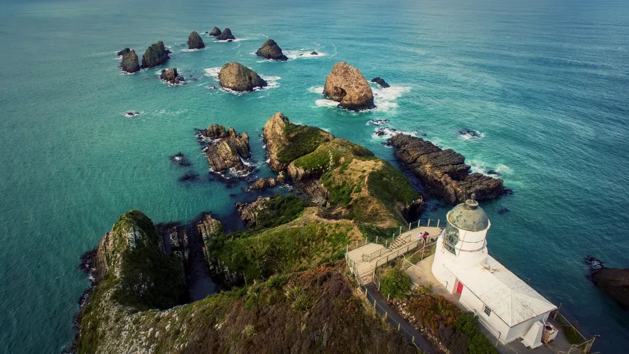 Aerial view of Nugget Point Lighthouse and rocky islets in The Catlins, Southland, New Zealand