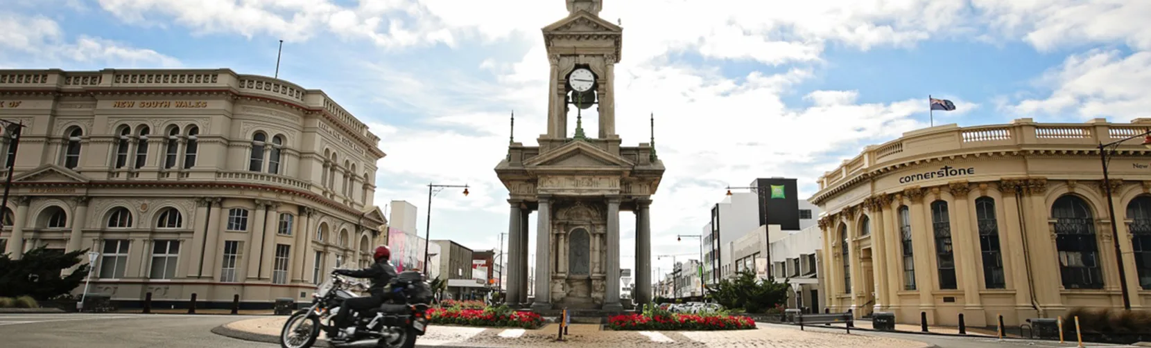 Motorcyclist passing the Troopers Memorial during the Burt Munro Challenge in Invercargill