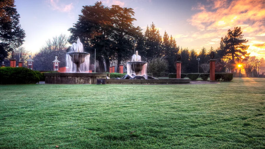 Fountains at sunrise in Queens Park, Invercargill, Southland New Zealand