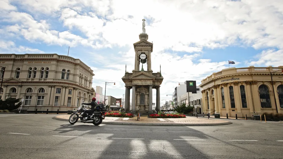 Motorcyclist passing the Troopers Memorial during the Burt Munro Challenge in Invercargill