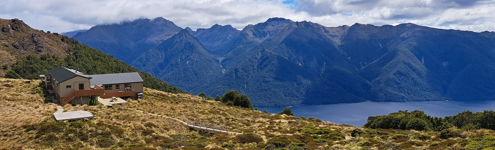 Luxmore Hut with views over Lake Te Anau on the Kepler Track, Southland, New Zealand