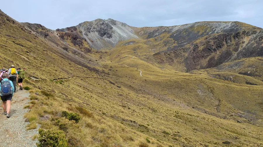 Trampers on alpine ridgeline of the Kepler Track, Southland, New Zealand