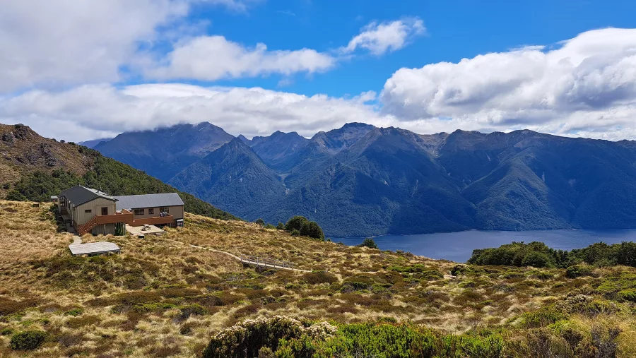 Luxmore Hut with views over Lake Te Anau on the Kepler Track, Southland, New Zealand