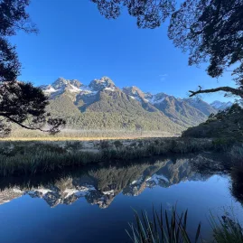 Clear morning reflections at Mirror Lakes on the Milford Road in Southland, New Zealand