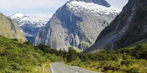 Snow-capped mountains above Milford Road near Homer Tunnel in Southland, New Zealand
