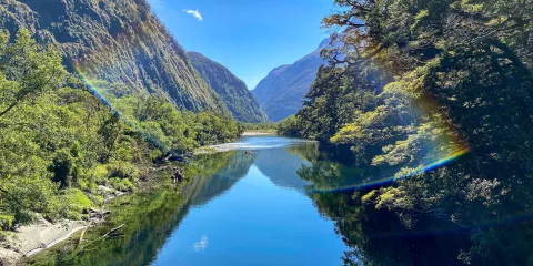 Rainbow over the Arthur River on the Milford Track in Fiordland National Park, New Zealand