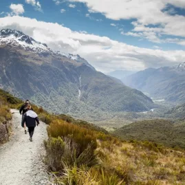 Walking trail descending from Key Summit with panoramic views over Fiordland National Park.