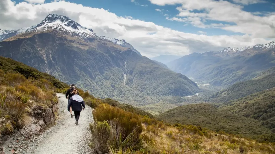 Walking trail descending from Key Summit with panoramic views over Fiordland National Park.