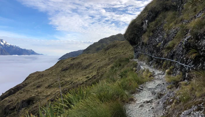 Climbing from Lake Mackenzie Hut to Harris Saddle on the Routeburn Track, New Zealand