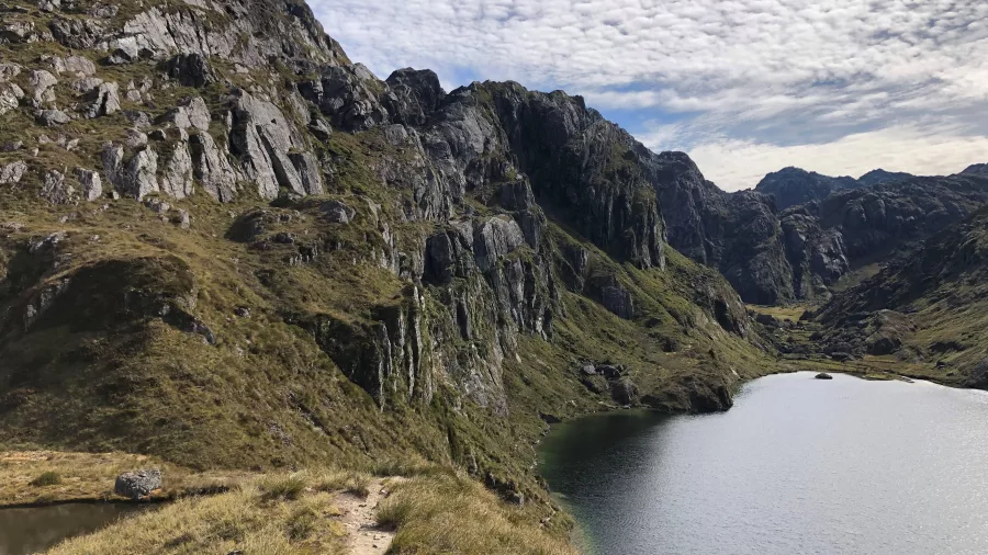 Lake Harris surrounded by mountains on the Routeburn Track, New Zealand