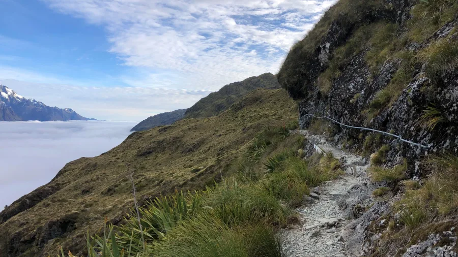Climbing from Lake Mackenzie Hut to Harris Saddle on the Routeburn Track, New Zealand
