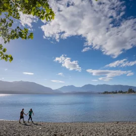 Walking along Lake Te Anau lakefront in Southland New Zealand