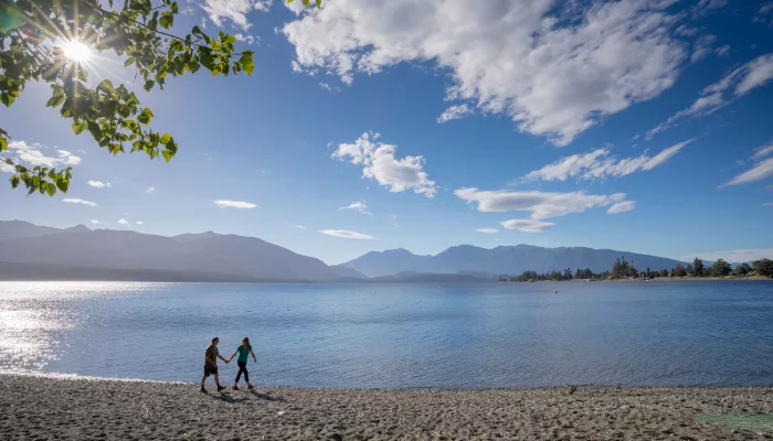 Walking along Lake Te Anau lakefront in Southland New Zealand