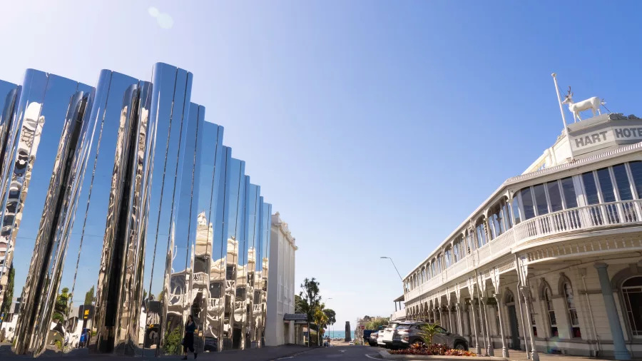 Modern Len Lye Centre next to the historic White Hart Hotel in New Plymouth