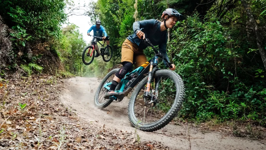 Mountain biker tackling forested singletrack at Craters Mountain Bike Park in Taupō