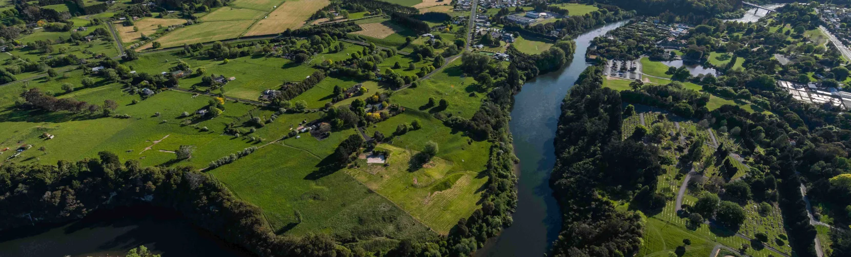 Aerial view of the Waikato River flowing through Hamilton, New Zealand.