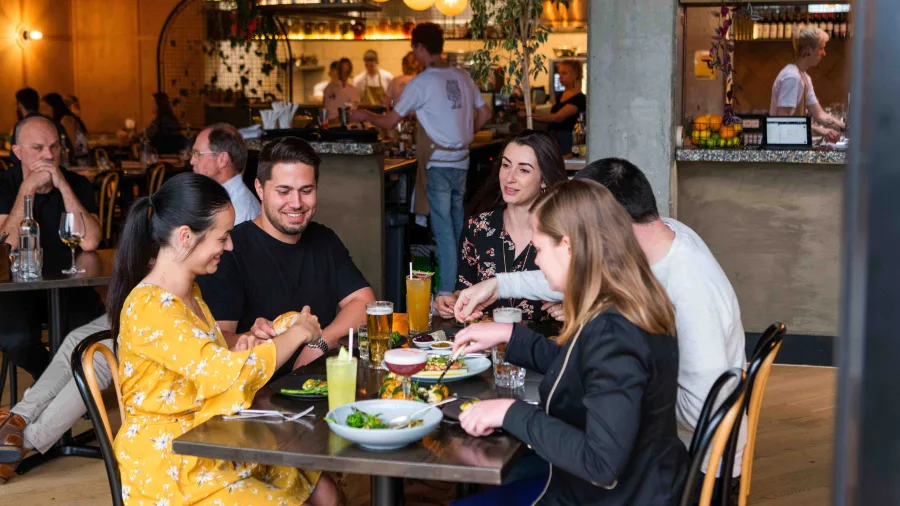 Group dining at a restaurant in Hamilton City, Waikato.