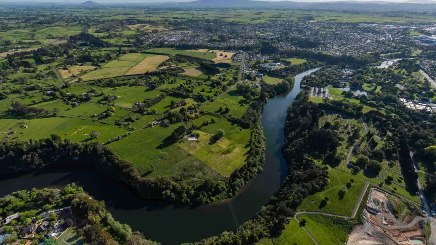 Aerial view of the Waikato River flowing through Hamilton, New Zealand.