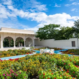Ornate pavilion and colourful flower beds in the Indian Char Bagh Garden at Hamilton Gardens in Waikato