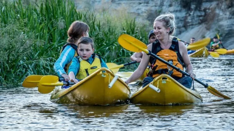 Family kayaking tour in Waikato canyon with Riverside Adventures