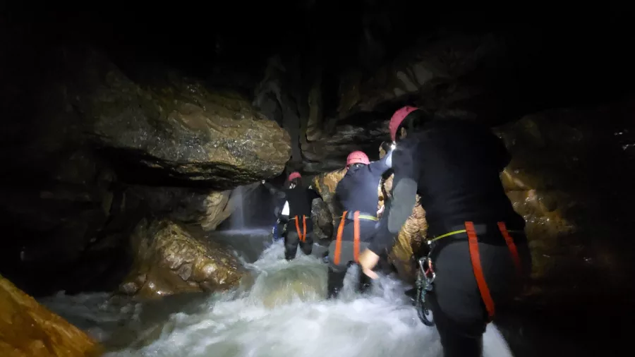 Underground river caving expedition in Waitomo