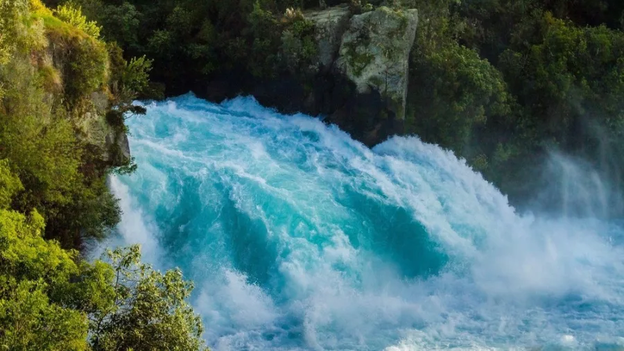 Powerful blue waters cascading at Huka Falls near Taupo, New Zealand
