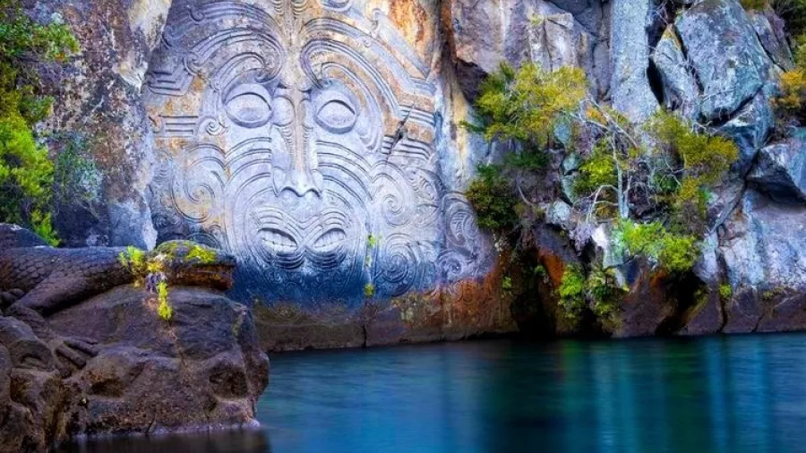 Ngātoroirangi Māori Rock Carvings at sunset on Lake Taupō