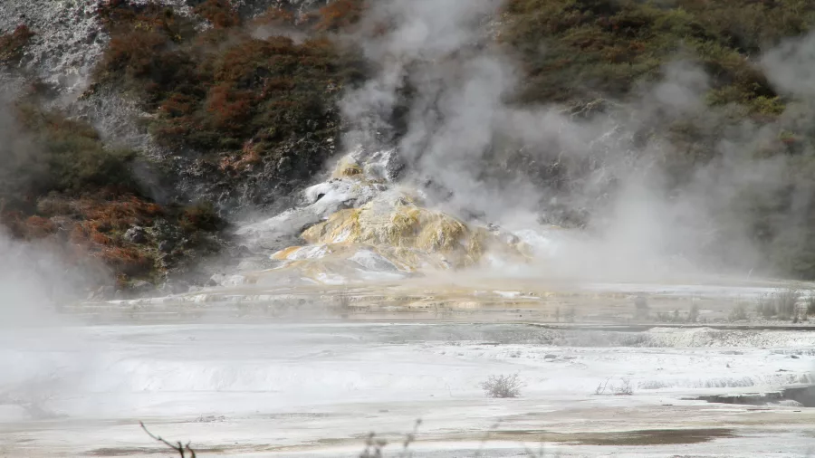 Steaming geothermal feature with yellow silica at Orakei Korako